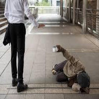 Video: A man walks past a beggar