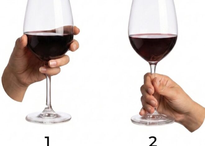 How to hold a wine glass?