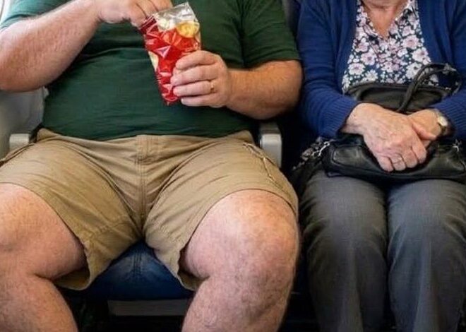 A man spread his legs into my airplane seat for hours refusing to give me any space But when he came back from the restroom he stared at his seat and screamed What the hell did you do